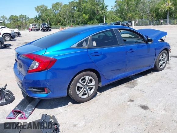 2018 Honda Civic LX with VIN 19XFC2F54JE027744, listed as a IAAI auction lot 42038398 with 119,250 mi miles and . Bid and sale history available at DreamBid. Image 4.