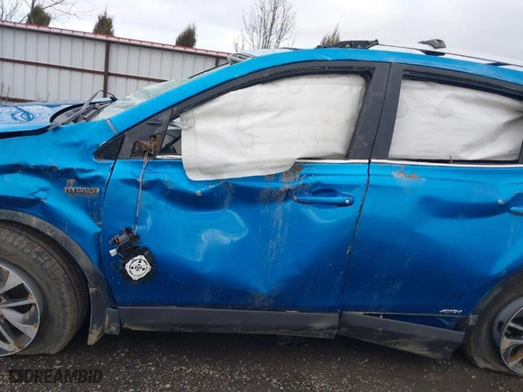 2016 Toyota RAV4 Hybrid XLE with VIN JTMRJREVXGD043129, listed as a IAAI auction lot 41786071 with 97,919 mi miles. Bid and sale history available at carsss.com. Image 14.