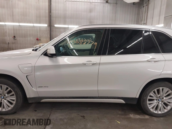 2016 BMW X5 xDrive40e with VIN 5UXKT0C50G0S77165, listed as a IAAI auction lot 40688779 with 110,317 mi miles and . Bid and sale history available at carsss.com. Image 15.