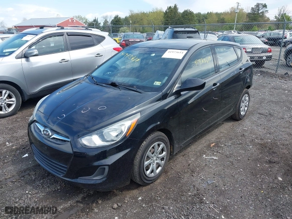 2014 Hyundai Accent GS with VIN KMHCT5AE3EU193249, listed as a IAAI auction lot 41973614 with 136,655 mi miles. Bid and sale history available at carsss.com. Image 2.