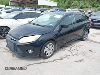2012 Ford Focus SE with VIN 1FAHP3F28CL361932, listed as a IAAI auction lot 42142318 with 135,179 mi miles and . Bid and sale history available at carsss.com. Image 2.