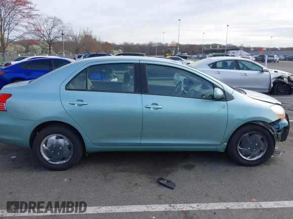 2009 Toyota Yaris with VIN JTDBT903794060474, listed as a IAAI auction lot 42005903 with 104,607 mi miles. Bid and sale history available at carsss.com. Image 13.
