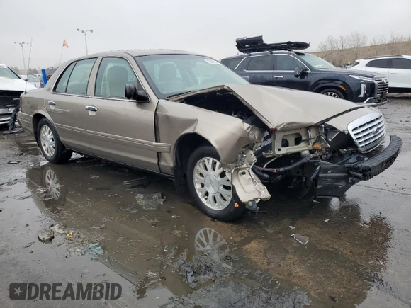2005 Ford Crown Victoria LX z VIN 2FAFP74W05X122403, wystawiony jako Copart lot #45305825 z przebiegiem 202 381 mil mil oraz Szkoda całkowita • Salvage title. Historia ofert i sprzedaży dostępna na DreamBid. Obrazek 4.