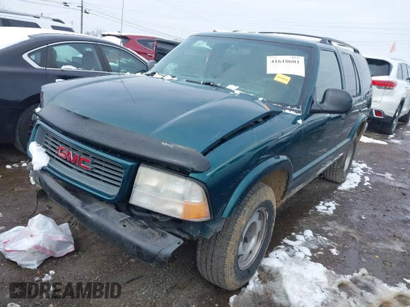 1998 GMC Jimmy SL with VIN 1GKCS13W4W2562613, listed as a IAAI auction lot 41610601 with 1 mi miles. Bid and sale history available at carsss.com. Image 2.