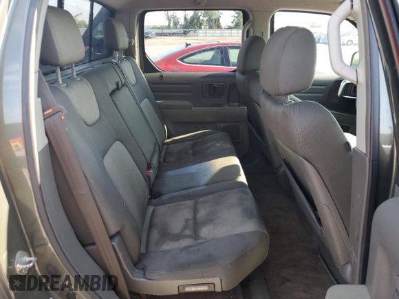 2006 Honda Ridgeline RTS z VIN 2HJYK16496H511588, wystawiony jako Copart lot #58240785 z przebiegiem 197 639 mil mil oraz Szkoda całkowita • Salvage title. Historia ofert i sprzedaży dostępna na DreamBid. Obrazek 10.