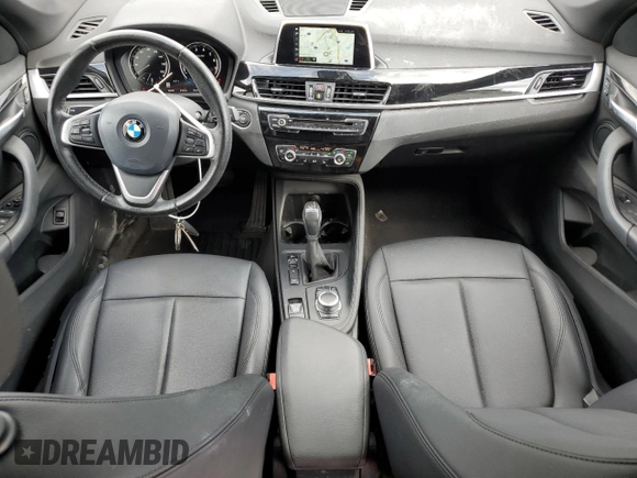 2019 BMW X1 xDrive28i with VIN WBXHT3C59K5L90317, listed as a Copart auction lot 61028125 with 46,789 mi miles and Salvage title. Bid and sale history available at DreamBid. Image 8.