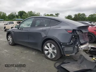 2024 Tesla Model Y z VIN 7SAYGDED5RF018979, wystawiony jako Copart lot #55651195 z przebiegiem 10 488 mil mil oraz Czysty tytuł • Clean title. Historia ofert i sprzedaży dostępna na DreamBid. Obrazek 2.