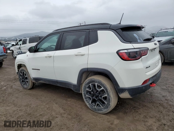 2021 Jeep Compass Trailhawk with VIN 3C4NJDDB5MT590369, listed as a Copart auction lot 46107685 with 67,857 mi miles and Salvage title. Bid and sale history available at DreamBid. Image 2.