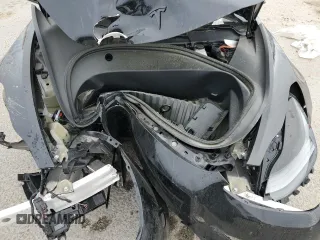 2023 Tesla Model 3 z VIN 5YJ3E1EA7PF668511, wystawiony jako Copart lot #51055725 z przebiegiem 53 594 mil mil oraz Szkoda całkowita • Salvage title. Historia ofert i sprzedaży dostępna na DreamBid. Obrazek 11.