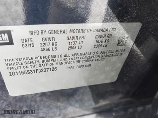 2015 Chevrolet Impala LTZ with VIN 2G1165S31F9237126, listed as a IAAI auction lot 41871382 with 20,286 mi miles. Bid and sale history available at carsss.com. Image 9.
