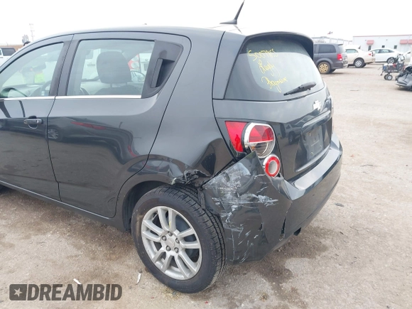 2014 Chevrolet Sonic LT with VIN 1G1JC6SH5E4153094, listed as a IAAI auction lot 41506576 with 118,833 mi miles. Bid and sale history available at carsss.com. Image 6.