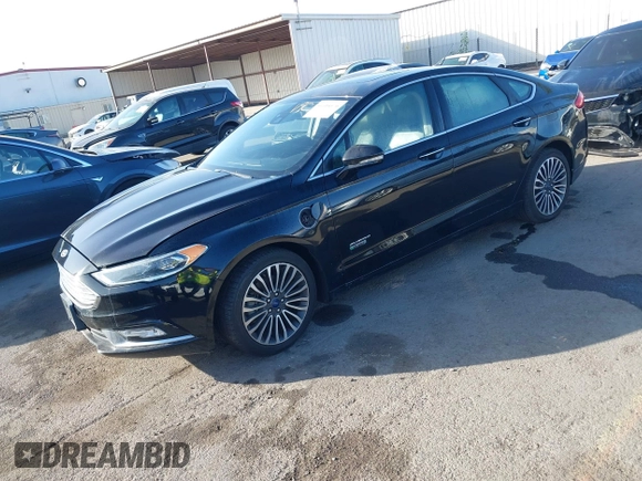 2017 Ford Fusion Energi SE with VIN 3FA6P0PU0HR129792, listed as a IAAI auction lot 41104376 with 86,659 mi miles. Bid and sale history available at carsss.com. Image 17.