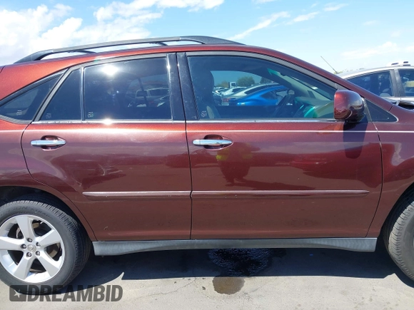 2009 Lexus RX 350 with VIN JTJGK31U899852422, listed as a IAAI auction lot 41976623 with 139,836 mi miles and . Bid and sale history available at DreamBid. Image 13.