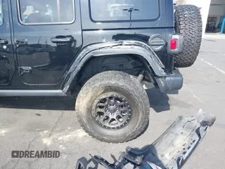 2022 Jeep Wrangler Unlimited Rubicon with VIN 1C4HJXFN0NW242903, listed as a IAAI auction lot 41448636 with 28,007 mi miles and . Bid and sale history available at DreamBid. Image 13.