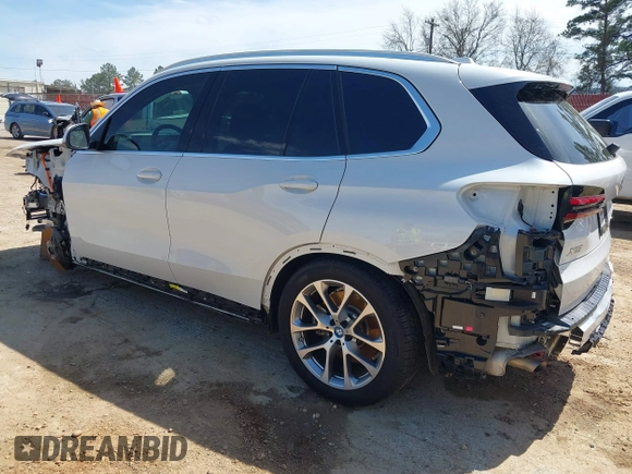 2024 BMW X5 xDrive50e with VIN 5UX43EU05R9T41661, listed as a IAAI auction lot 41819833 with 24,407 mi miles. Bid and sale history available at carsss.com. Image 3.