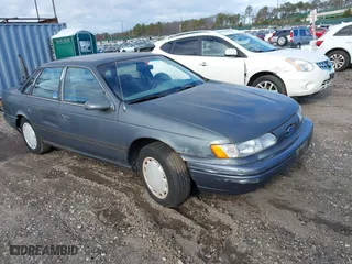 1994 Ford Taurus GL with VIN 1FALP52U1RA101129, listed as a IAAI auction lot 41231422 with 89,632 mi miles. Bid and sale history available at carsss.com. Image 1.