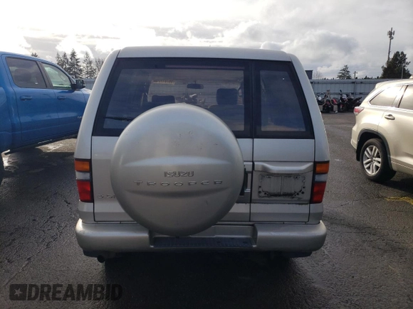 1998 Isuzu Trooper S with VIN JACDJ58X2W7904783, listed as a Copart auction lot 86781754 with 175,643 mi miles and Clean title. Bid and sale history available at DreamBid. Image 6.