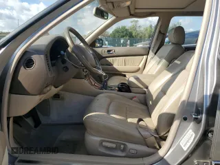1996 Lexus LS 400 z VIN JT8BH22F1T0065795, wystawiony jako Copart lot #57070565 z przebiegiem 86 261 mil mil oraz Szkody całkowita. Historia ofert i sprzedaży dostępna na DreamBid. Obrazek 7.