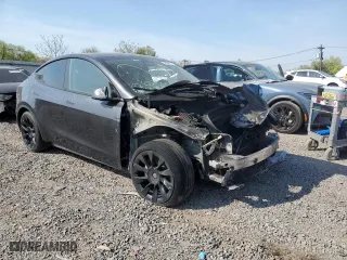 2024 Tesla Model Y with VIN 7SAYGDED3RF160506, listed as a Copart auction lot 53948515 with 0 mi miles and Non Repairable. Bid and sale history available at carsss.com. Image 4.