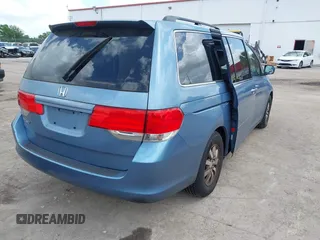 2010 Honda Odyssey EX-L with VIN 5FNRL3H69AB088994, listed as a IAAI auction lot 42007982 with 187,180 mi miles and . Bid and sale history available at DreamBid. Image 4.