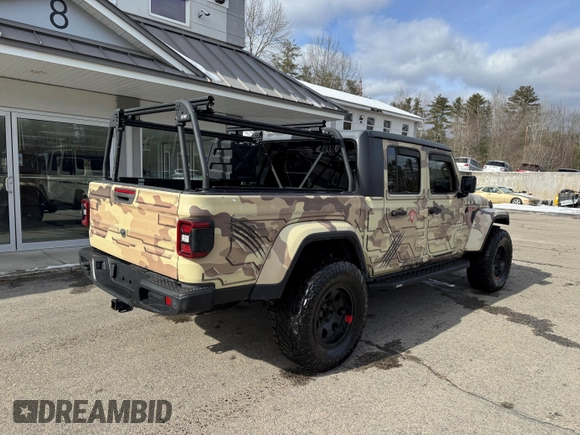 2021 Jeep Gladiator Willys with VIN 1C6HJTAG5ML526651, listed as a IAAI auction lot 41593639 with 162,543 mi miles. Bid and sale history available at carsss.com. Image 4.