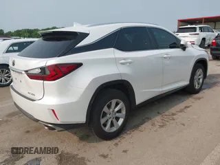 2016 Lexus RX 350 with VIN 2T2BZMCA7GC037567, listed as a IAAI auction lot 42352587 with 66,152 mi miles and . Bid and sale history available at DreamBid. Image 4.