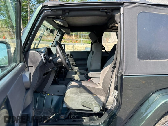 2010 Jeep Wrangler Sahara with VIN 1J4AA5D18AL222491, listed as a Copart auction lot 60045815 with 173,280 mi miles and Clean title. Bid and sale history available at DreamBid. Image 8.