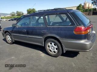 1996 Subaru Legacy with VIN 4S3BG4859T6986223, listed as a Copart auction lot 57683345 with 265,568 mi miles and Salvage title. Bid and sale history available at DreamBid. Image 2.