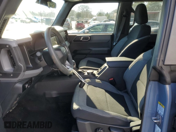 2023 Ford Bronco with VIN 1FMEE5DP0PLB17111, listed as a Copart auction lot 86588374 with 26,093 mi miles and Salvage Title. Bid and sale history available at DreamBid. Image 7.