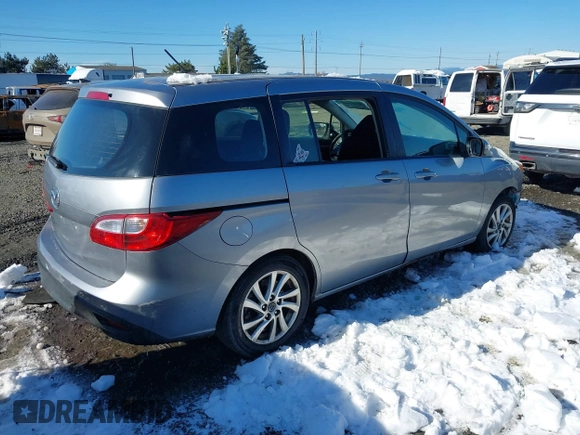 2014 Mazda 5 Sport with VIN JM1CW2BLXE0168119, listed as a IAAI auction lot 41527688 with 142,357 mi miles and . Bid and sale history available at DreamBid. Image 4.