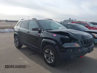 2019 Jeep Cherokee Trailhawk Elite with VIN 1C4PJMBX0KD395421, listed as a IAAI auction lot 41265048 with 70,070 mi miles. Bid and sale history available at carsss.com. Image 1.