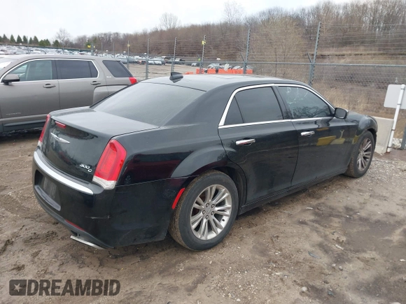 2016 Chrysler 300 with VIN 2C3CCAEG0GH348651, listed as a IAAI auction lot 41967981 with 141,728 mi miles. Bid and sale history available at carsss.com. Image 4.