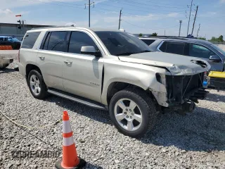 2016 Chevrolet Tahoe LT with VIN 1GNSKBKC7GR102138, listed as a Copart auction lot 57025525 with 165,439 mi miles and Salvage title. Bid and sale history available at DreamBid. Image 4.