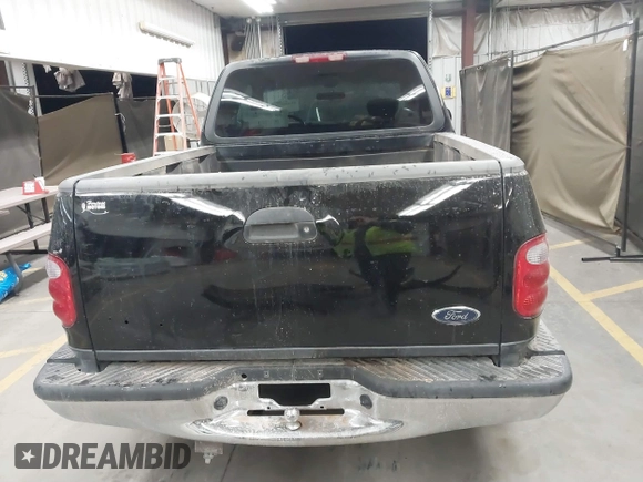 2001 Ford F-150 XL with VIN 1FTRX07W61KF82074, listed as a IAAI auction lot 41444721 with 125,494 mi miles. Bid and sale history available at carsss.com. Image 17.