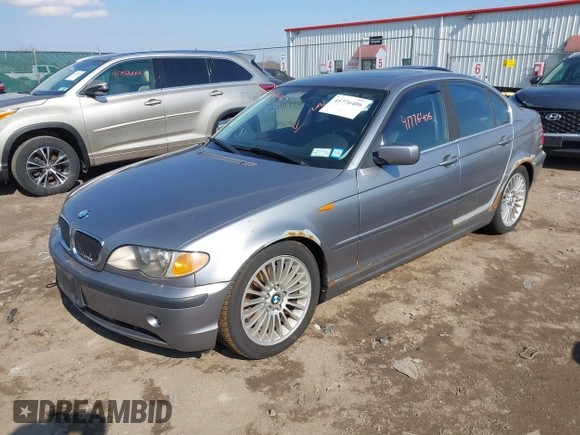 2003 BMW 3 Series 330xi with VIN WBAEW534X3PN31070, listed as a IAAI auction lot 41776406 with 176,383 mi miles. Bid and sale history available at carsss.com. Image 2.