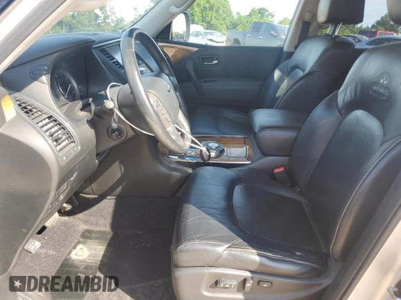 2012 Infiniti QX56 7-passenger with VIN JN8AZ2NF6C9518895, listed as a Copart auction lot 61084975 with 228,628 mi miles and Salvage title. Bid and sale history available at DreamBid. Image 7.
