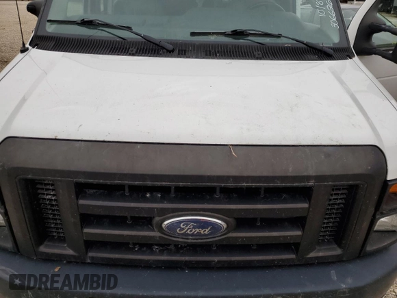 2009 Ford Econoline Cargo Commercial z VIN 1FTSE34L39DA01410, wystawiony jako Copart lot #77798344 z przebiegiem Nie podano mil oraz Szkoda całkowita • Salvage title. Historia ofert i sprzedaży dostępna na DreamBid. Obrazek 13.