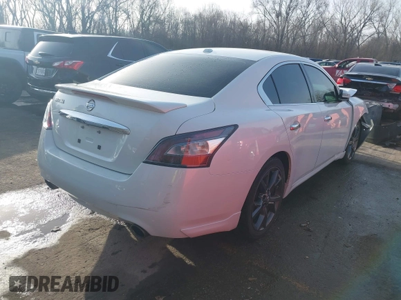 2013 Nissan Maxima SV with VIN 1N4AA5AP4DC821476, listed as a IAAI auction lot 41782887 with 140,956 mi miles and . Bid and sale history available at DreamBid. Image 4.