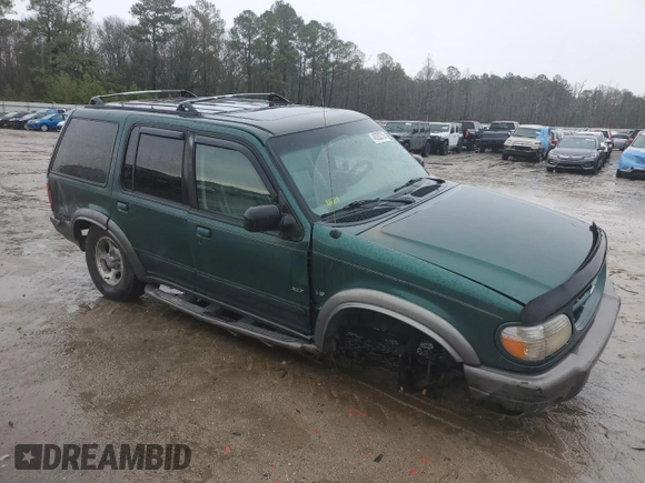 2000 Ford Explorer XLT z VIN 1FMDU83PXYZB03135, wystawiony jako Copart lot #45352705 z przebiegiem 228 604 mil mil oraz Szkoda całkowita • Salvage title. Historia ofert i sprzedaży dostępna na DreamBid. Obrazek 4.