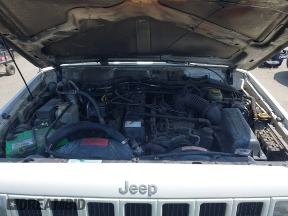 2000 Jeep Cherokee z VIN 1J4FT48S8YL214074, wystawiony jako IAAI lot #42577235 z przebiegiem 287 868 mil mil oraz . Historia ofert i sprzedaży dostępna na DreamBid. Obrazek 10.