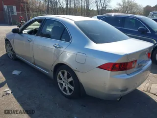 2004 Acura TSX w/Navigation with VIN JH4CL96904C039320, listed as a IAAI auction lot 42083615 with 195,844 mi miles. Bid and sale history available at carsss.com. Image 3.