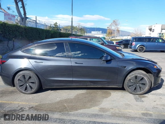2024 Tesla Model 3 with VIN 5YJ3E1EA0RF718703, listed as a IAAI auction lot 41278243 with 6,504 mi miles. Bid and sale history available at carsss.com. Image 13.