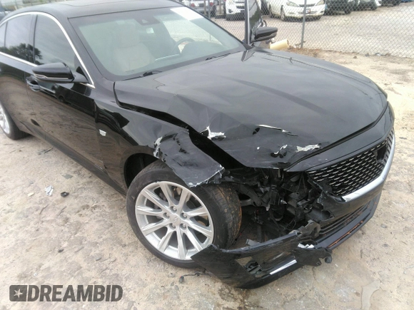2020 Cadillac CT5 Luxury z VIN 1G6DM5RK4L0100133, wystawiony jako IAAI lot #42133272 z przebiegiem 84 036 mil mil oraz . Historia ofert i sprzedaży dostępna na DreamBid. Obrazek 6.