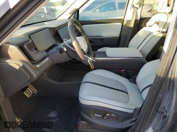 2024 Rivian R1S Adventure with VIN 7PDSGABA4RN031387, listed as a Copart auction lot 75098504 with Not Provided miles and Salvage Title. Bid and sale history available at carsss.com. Image 7.