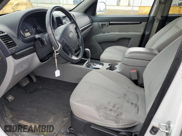 2009 Hyundai Santa Fe GL with VIN 5NMSG13EX9H312227, listed as a Copart auction lot 62176495 with 153,746 mi miles and Salvage title. Bid and sale history available at DreamBid. Image 7.