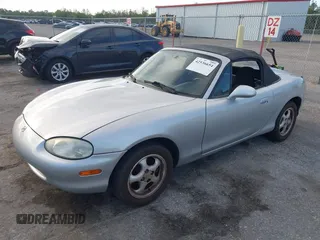 1999 Mazda MX-5 Miata with VIN JM1NB3534X0124237, listed as a IAAI auction lot 42536654 with 92,696 mi miles and . Bid and sale history available at DreamBid. Image 18.