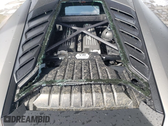 2016 Lamborghini Huracan z VIN ZHWUC2ZF2GLA04811, wystawiony jako Copart lot #72161434 z przebiegiem 24 565 mil mil oraz Szkody całkowita. Historia ofert i sprzedaży dostępna na DreamBid. Obrazek 11.