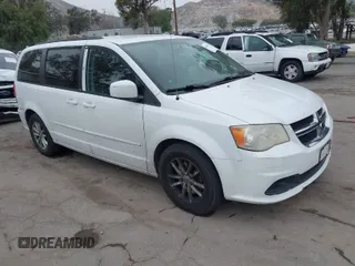 2014 Dodge Grand Caravan SXT with VIN 2C4RDGCG1ER304836, listed as a IAAI auction lot 42049558 with 186,831 mi miles and . Bid and sale history available at DreamBid. Image 1.
