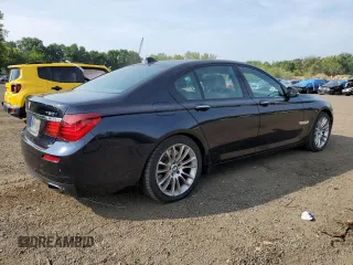 2015 BMW 7 Series 750i xDrive with VIN WBAYB6C53FD966042, listed as a Copart auction lot 69387464 with 64,977 mi miles and Salvage Title. Bid and sale history available at carsss.com. Image 3.