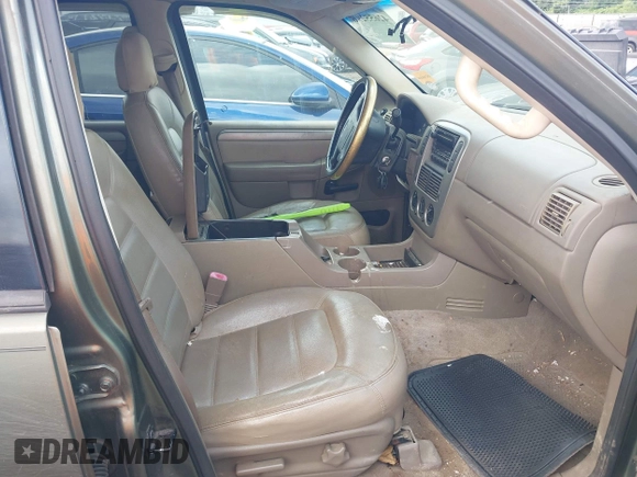 2004 Ford Explorer XLT z VIN 1FMZU73WX4UA64464, wystawiony jako IAAI lot #42655296 z przebiegiem 212 510 mil mil oraz . Historia ofert i sprzedaży dostępna na DreamBid. Obrazek 5.